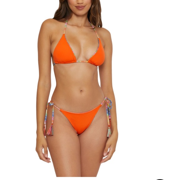 Selling this swimsuit. Never worn. Size Medium top and bottom. Reversible. - Picture 3 of 6